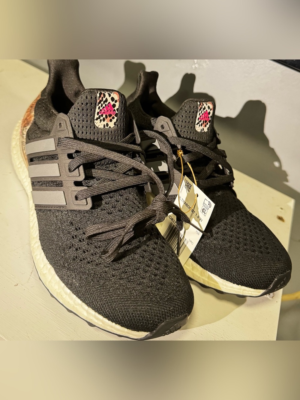adidas Women’s Black Sneakers with Pink Leopard Accent